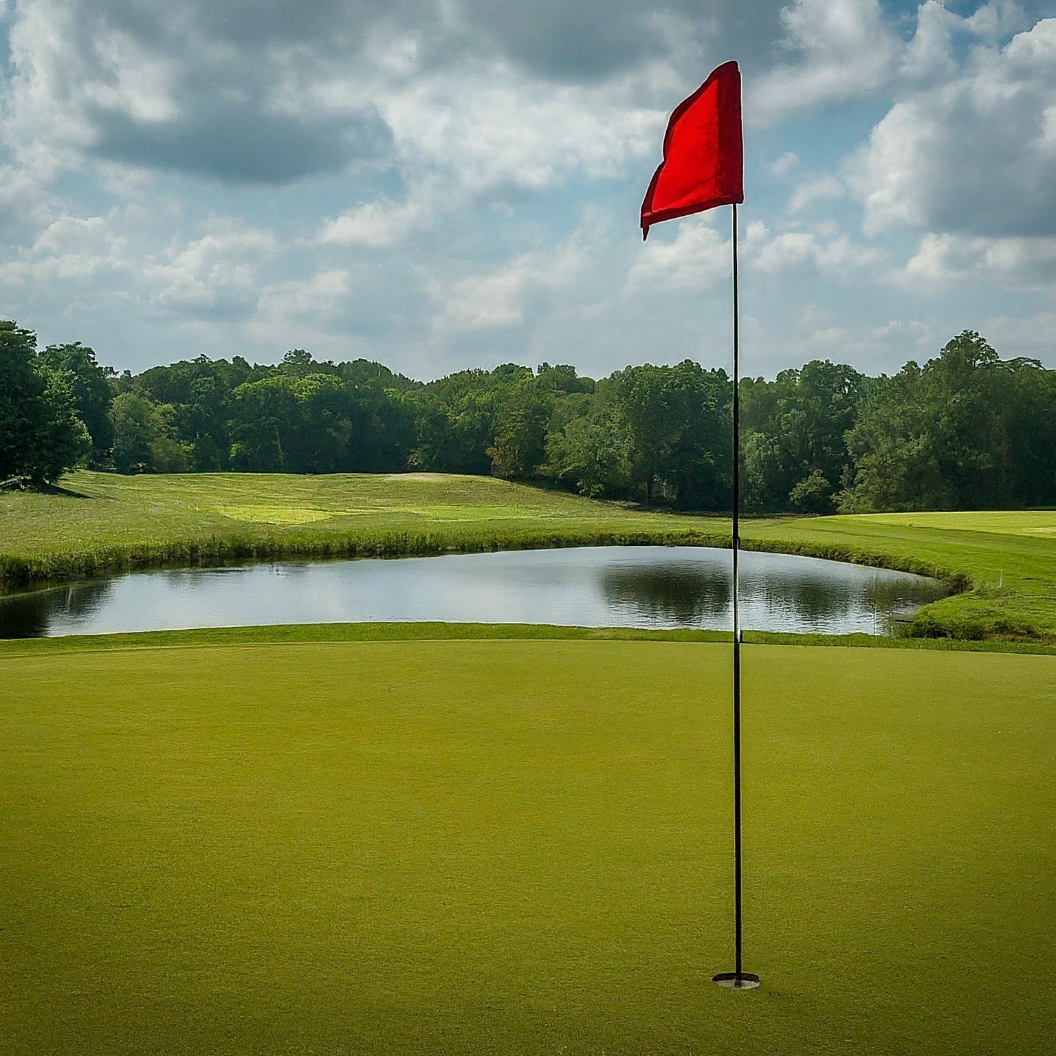 View of Hole 12, a Par 3 over water.